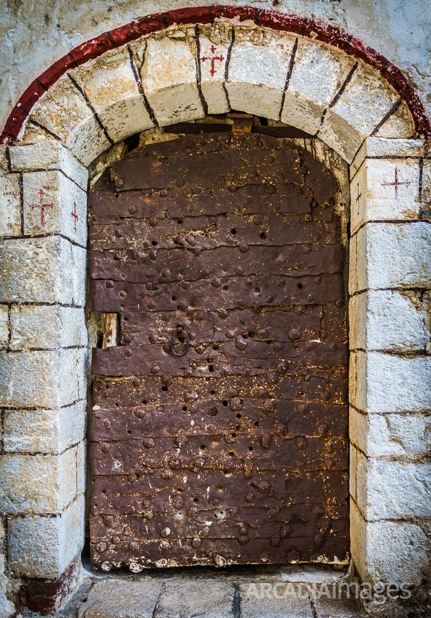 The main gate to the Prodromou Monastery full of bullet holes. Arcadia, Peloponnese