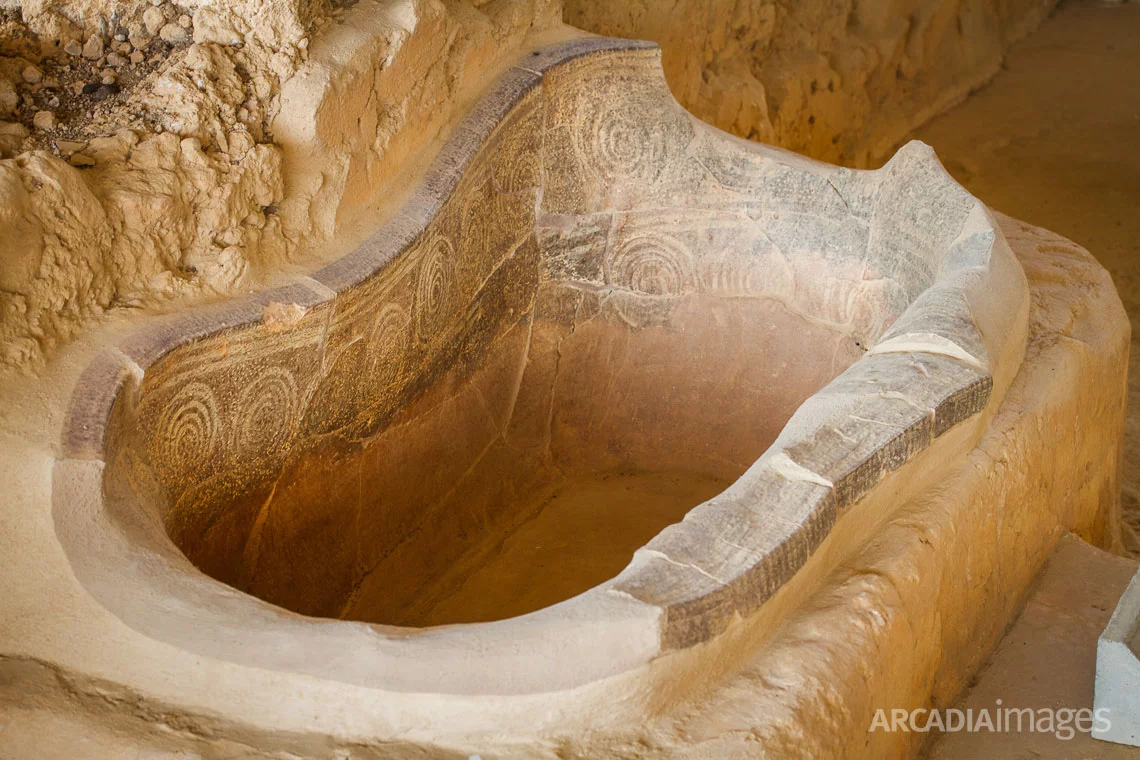 Mycenaean bathtub, or larnax, made of terracotta decorated with circular patterns, 13th century B.C. This is said to be the one described by Homer in Odyssey, where Nestor's youngest daughter, Polykaste, bathed Telemachos, son of Odysseus when he came searching for his father. Palace of Nestor, Epano Eglianos, Messenia, Peloponnese