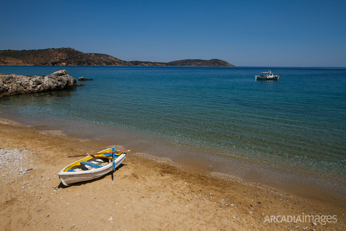 Fishing boats at Aghia Varvara (Saint Barbara) beach, named after the Byzantine chapel on the middle of it. Skoutari, Laconia, Peloponnese