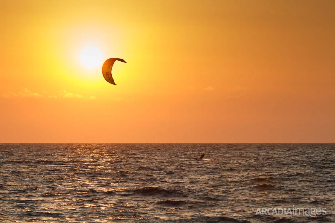 A Kitesurfer at Navarino Bay, close to Gialova beach. Gialova, Messenia, Peloponnese